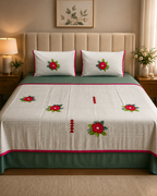 Ivory and sage green bed ensemble with red floral embroidery and matching pillow covers