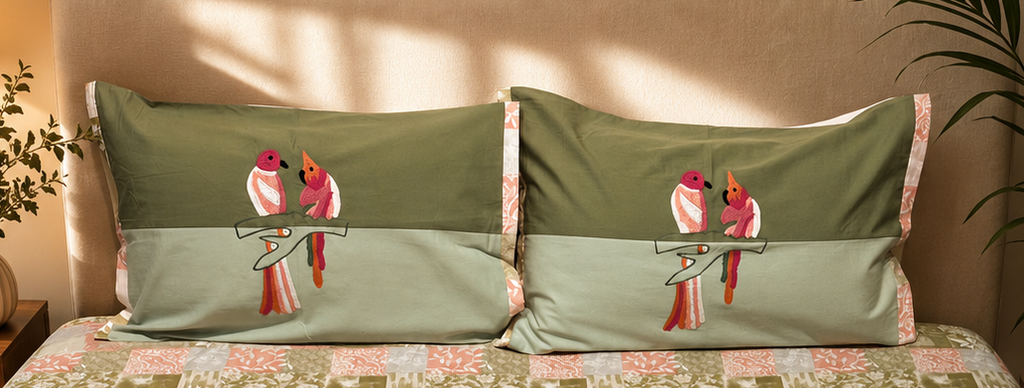 Olive green and peach patchwork bedsheet set with embroidered bird pillow covers by Rituxe Living